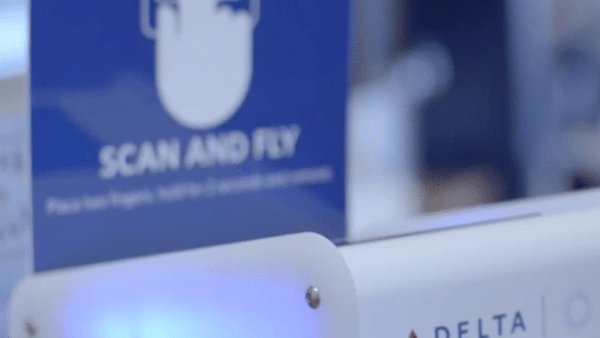 Delta Air Lines Scan and Fly biometric boarding kiosk with fingerprint scanner