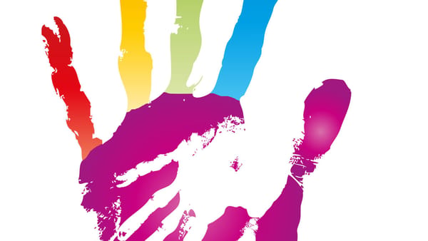 Conceptual image of a woman's and a child's hands