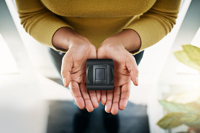Columbo fingerprint scanner resting in open hands